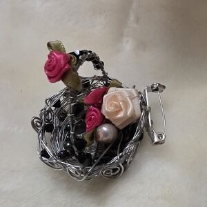 Elegant Wire Basket Brooch with Pink and Cream Roses